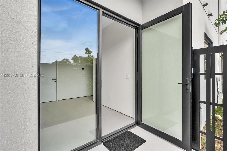 Exterior details and patio area of a home in , Miami (Image 4).