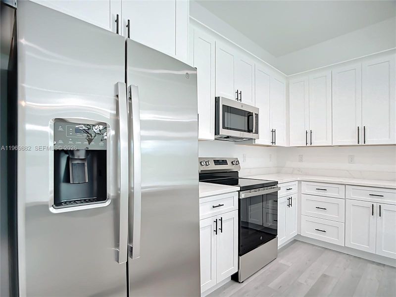 Furnished interior view inside a new home in , Port Charlotte (Image 7).