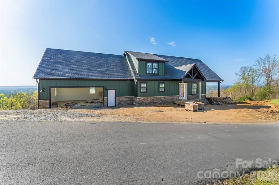 Front elevation situated at the top of the mountain with 360 degree views Front elevation situated at the top of the mountain with 360 degree views