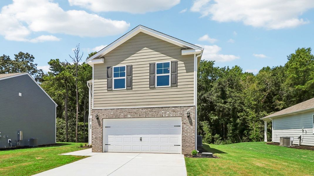 Front exterior of a new home in Sease's Pond, Gilbert, SC, highlighting curb appeal (Image 18).