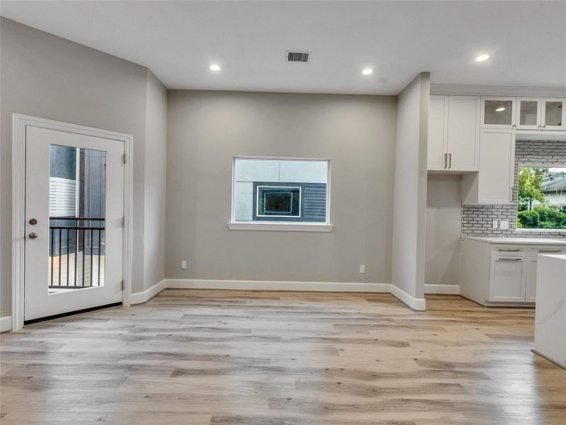 Dining area with balcony entrance - Second floor Dining area with balcony entrance - Second floor
