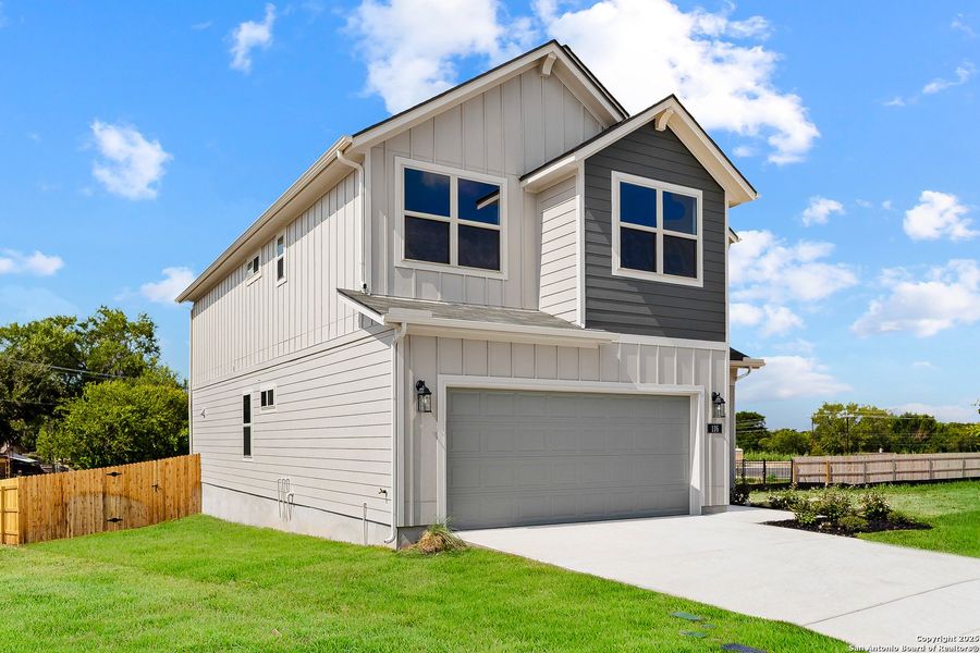 Front exterior of a new home in Trilogy Grove, Leon Valley, TX, highlighting curb appeal (Image 2). Front exterior of a new home in Trilogy Grove, Leon Valley, TX, highlighting curb appeal (Image 2).