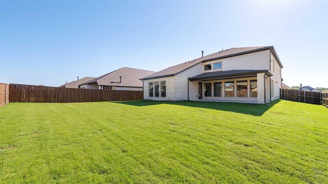 Exterior details and patio area of a home in Devonshire - Reserve 50', Forney (Image 2). Exterior details and patio area of a home in Devonshire - Reserve 50', Forney (Image 2).