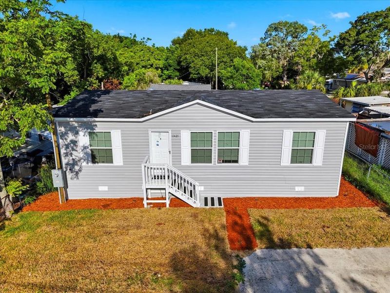 Exterior details and patio area of a home in , Port Richey (Image 20).