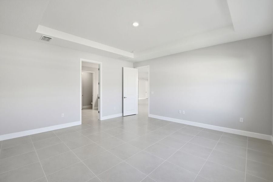 Representative unfurnished interior of a home built from the Cumberland by Taylor Morrison in Harvest at Ovation, Winter Garden (Image 49).