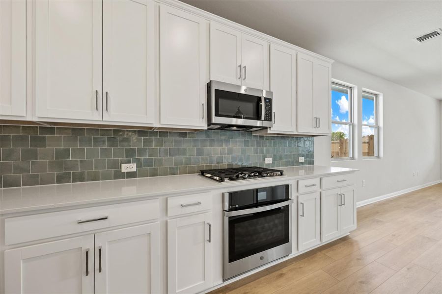 Furnished interior view inside a new home in Rolling Glen, Hutto (Image 6).