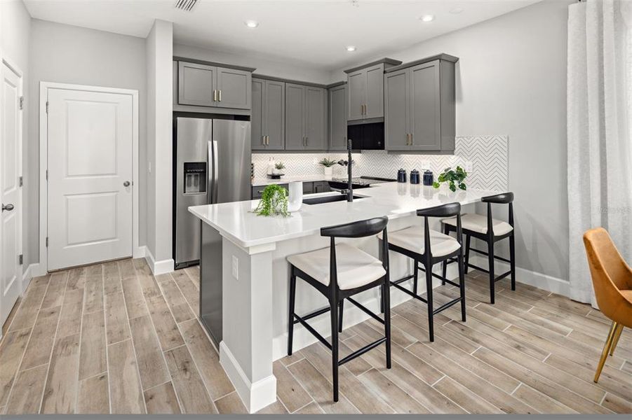 Furnished interior view inside a new home in Gardenia Reserve, Apopka (Image 6).