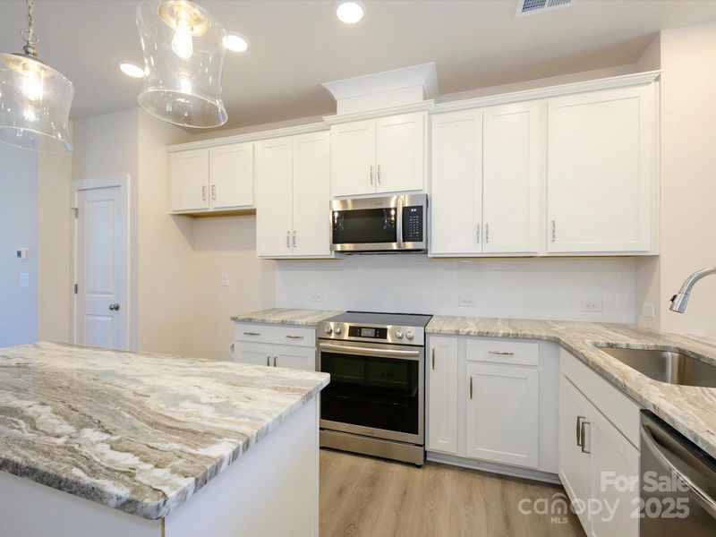 Furnished interior view inside a new home in , Charlotte (Image 13). Furnished interior view inside a new home in , Charlotte (Image 13).