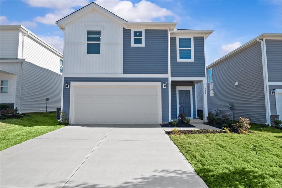Front exterior of a new home in Village at White Pine, Pendleton, SC, highlighting curb appeal (Image 1). Front exterior of a new home in Village at White Pine, Pendleton, SC, highlighting curb appeal (Image 1).