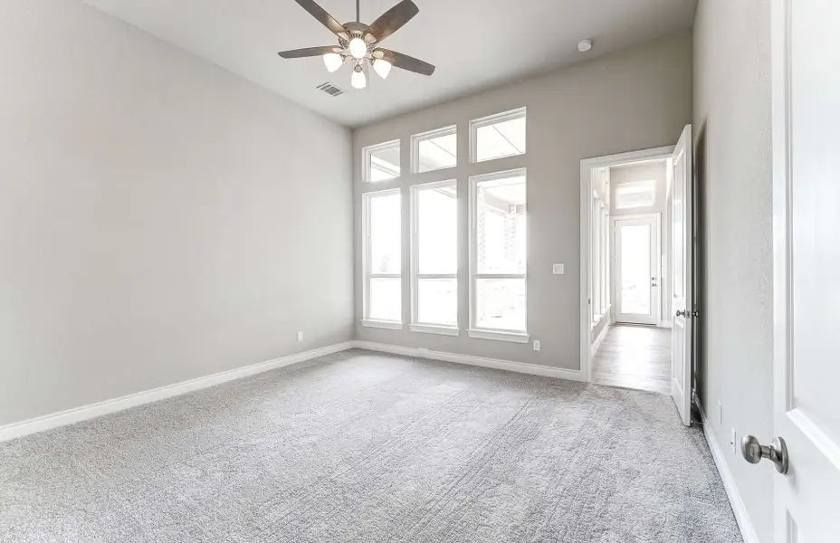 Representative unfurnished interior of a home built from the 2909 by Ravenna Homes in The Woodlands Hills 65′, Willis (Image 27). Representative unfurnished interior of a home built from the 2909 by Ravenna Homes in The Woodlands Hills 65′, Willis (Image 27).