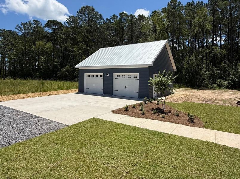 Front exterior of a new home in , Holly Hill, SC, highlighting curb appeal (Image 1). Front exterior of a new home in , Holly Hill, SC, highlighting curb appeal (Image 1).