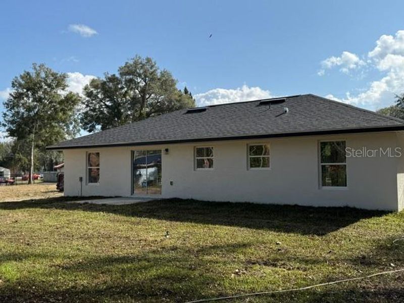 Exterior details and patio area of a home in , Summerfield (Image 21).