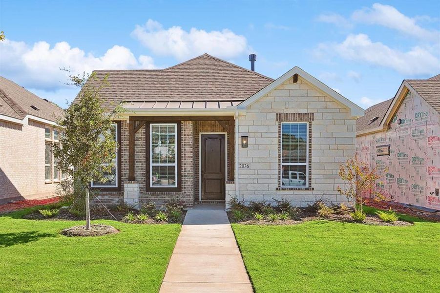 View of front of property featuring a front yard