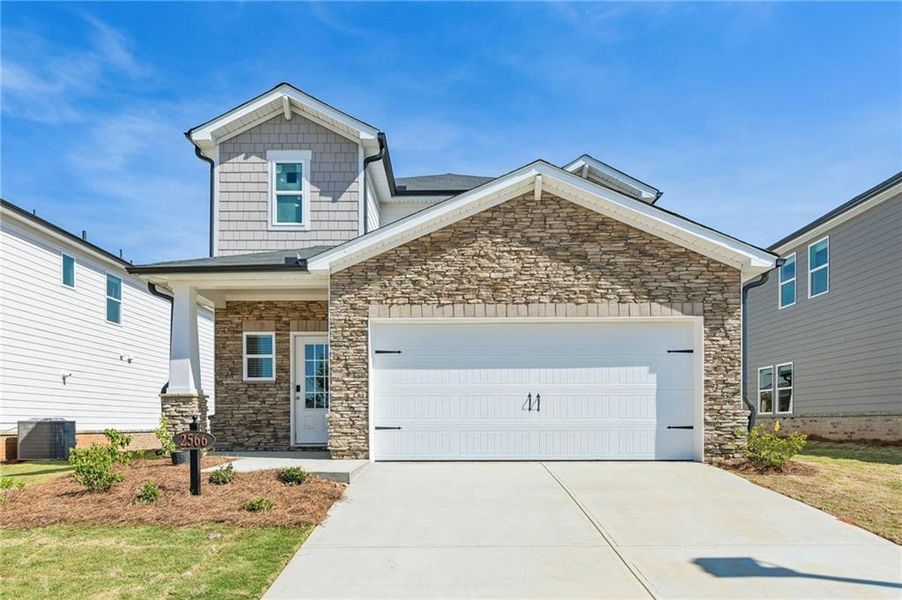 Front exterior of a new home in Martin Springs - Reserve Series, Lawrenceville, GA, highlighting curb appeal (Image 25).
