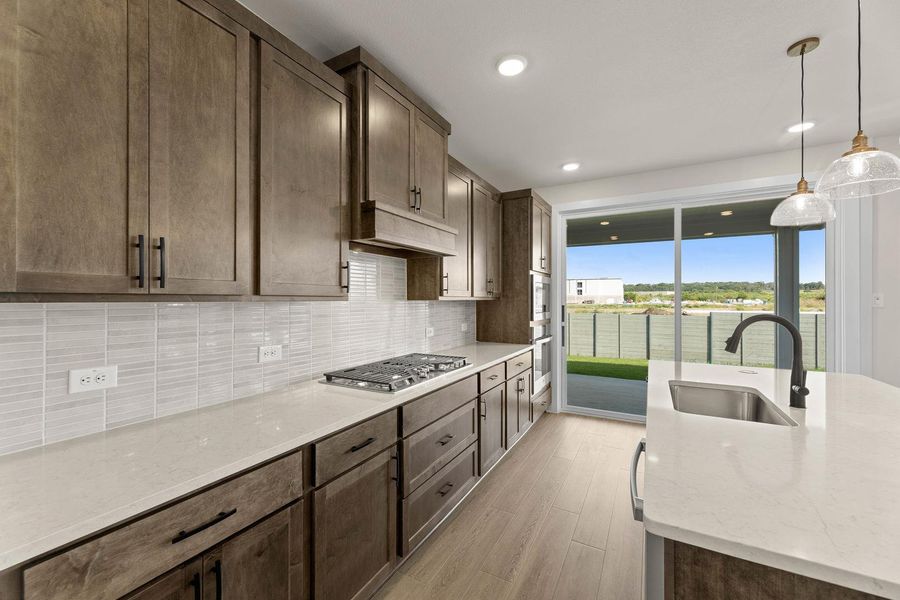 Furnished interior view inside a new home in Cottage Collection at Harvest, Argyle (Image 8).