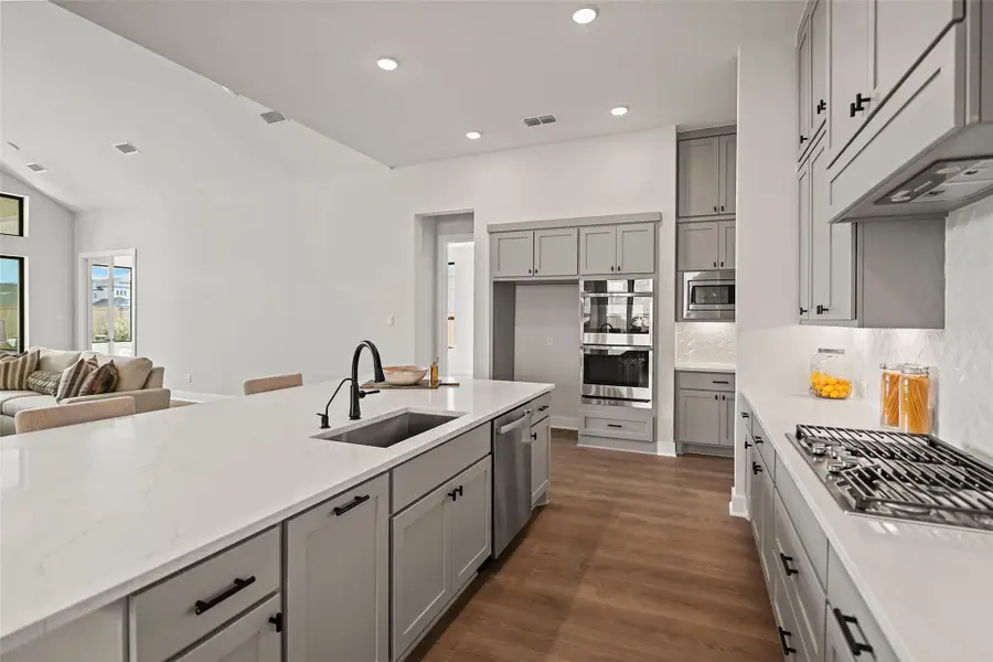 Furnished interior view inside a new home in Bridgeland 70′, Cypress (Image 8).