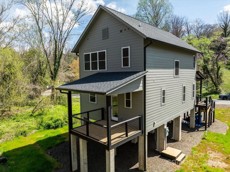 Front exterior of a new home in , Asheville, NC, highlighting curb appeal (Image 19).