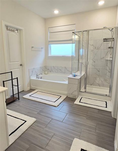 Primary bathroom with tub / shower.