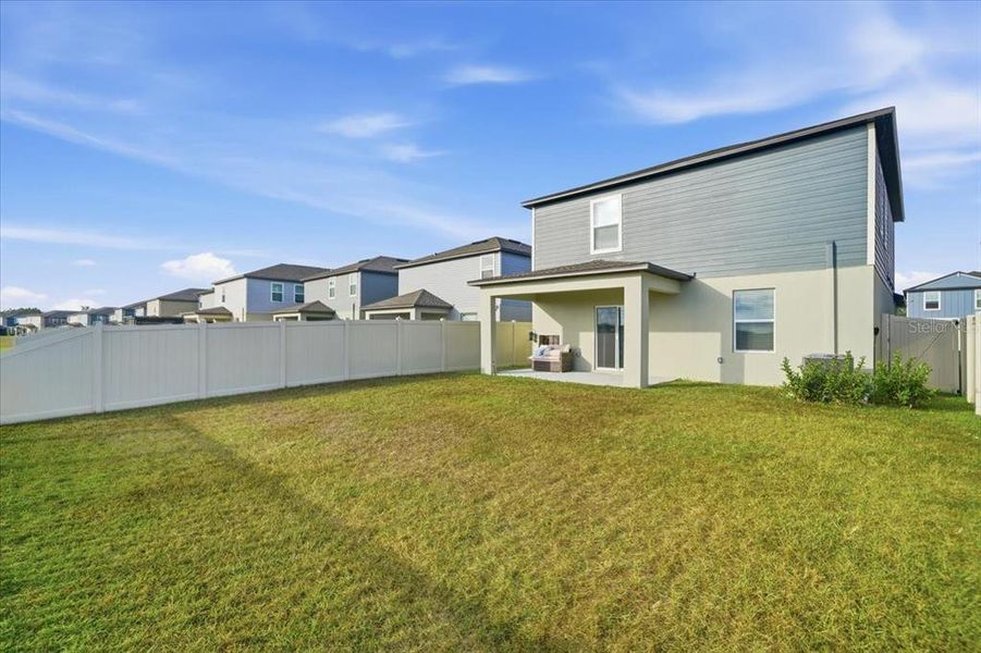Exterior details and patio area of a home in Two Rivers: The Manors II, Zephyrhills (Image 3). Exterior details and patio area of a home in Two Rivers: The Manors II, Zephyrhills (Image 3).