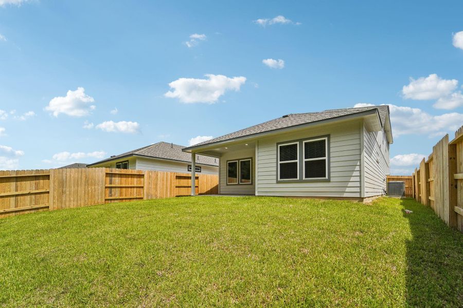Front exterior of a new home in Landing Meadows - Traditional Series, New Caney, TX, highlighting curb appeal (Image 2). Front exterior of a new home in Landing Meadows - Traditional Series, New Caney, TX, highlighting curb appeal (Image 2).