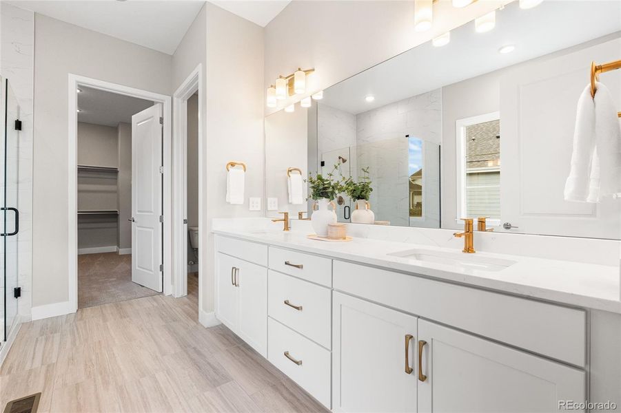 Furnished interior view inside a new home in Hilltop at Inspiration, Aurora (Image 33).