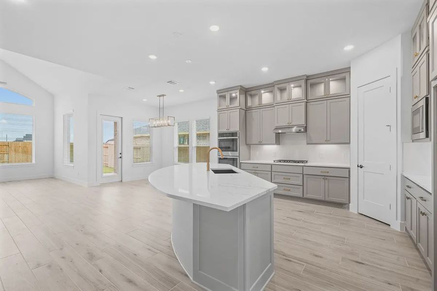 Representative furnished interior of a home built from the Madison by Chesmar Homes in Grange, Katy (Image 9).