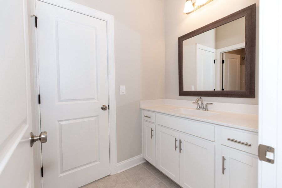 Representative furnished interior of a home built from the The Charleston by The Providence Group in Aberdeen, Hoschton (Image 30).