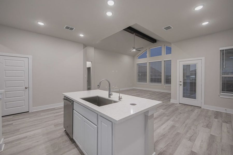 Representative furnished interior of a home built from the Morgan by Chesmar Homes in Stillwater Ranch, San Antonio (Image 5).