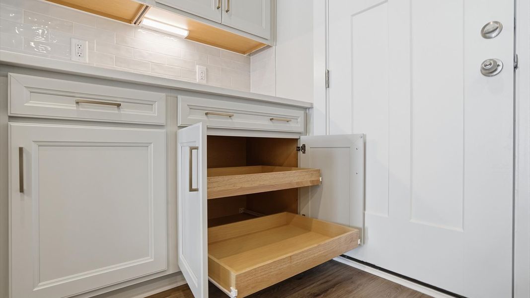 Expansive kitchen offering exceptional storage and sleek cabinetry located at Village at Midway Expansive kitchen offering exceptional storage and sleek cabinetry located at Village at Midway
