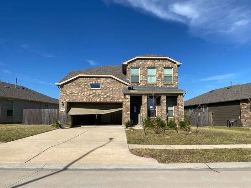 Front exterior of a new home in Myrtle Gardens, Magnolia, TX, highlighting curb appeal (Image 1). Front exterior of a new home in Myrtle Gardens, Magnolia, TX, highlighting curb appeal (Image 1).