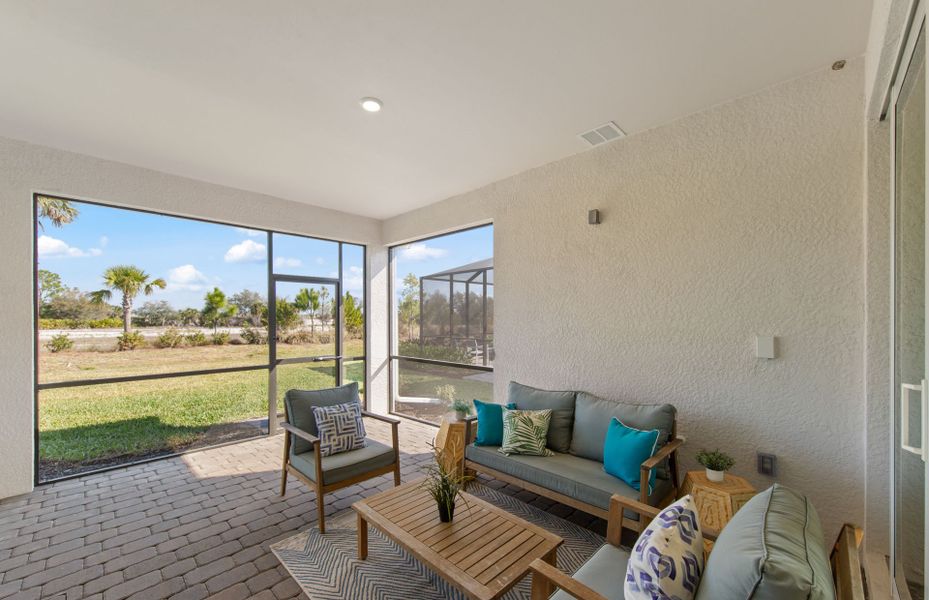 Exterior details and patio area of a home in TerraWalk at Babcock Ranch, Alva (Image 26).