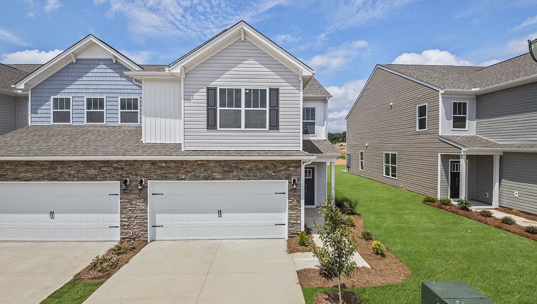 Front exterior of a new home in Skybrook Corners, Huntersville, NC, highlighting curb appeal (Image 1). Front exterior of a new home in Skybrook Corners, Huntersville, NC, highlighting curb appeal (Image 1).