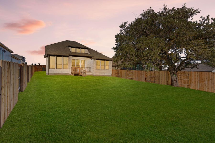 Rear of Home and Private Backyard