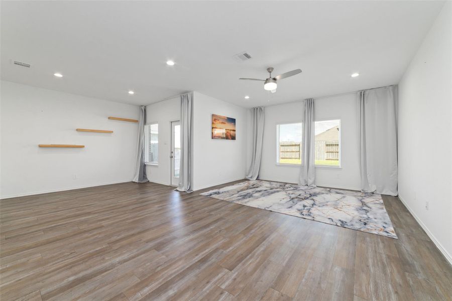 Spacious, unfurnished interior of a new home in Sunterra, Katy (Image 27).