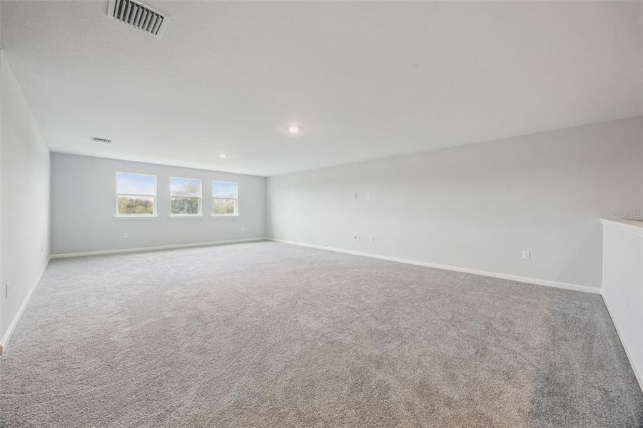 Spacious, unfurnished interior of a new home in Talichet, Howey-in-the-Hills (Image 27).