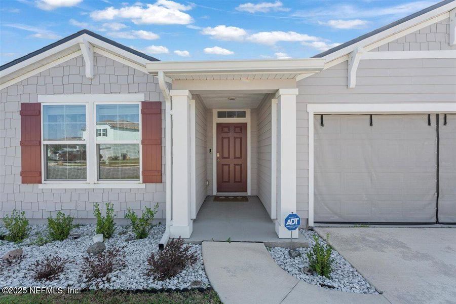 Exterior details and patio area of a home in Dorado at Entrada, St. Augustine (Image 25). Exterior details and patio area of a home in Dorado at Entrada, St. Augustine (Image 25).