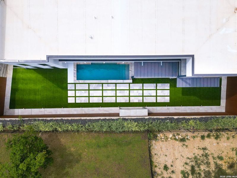 Exterior details and patio area of a home in , San Antonio (Image 33).