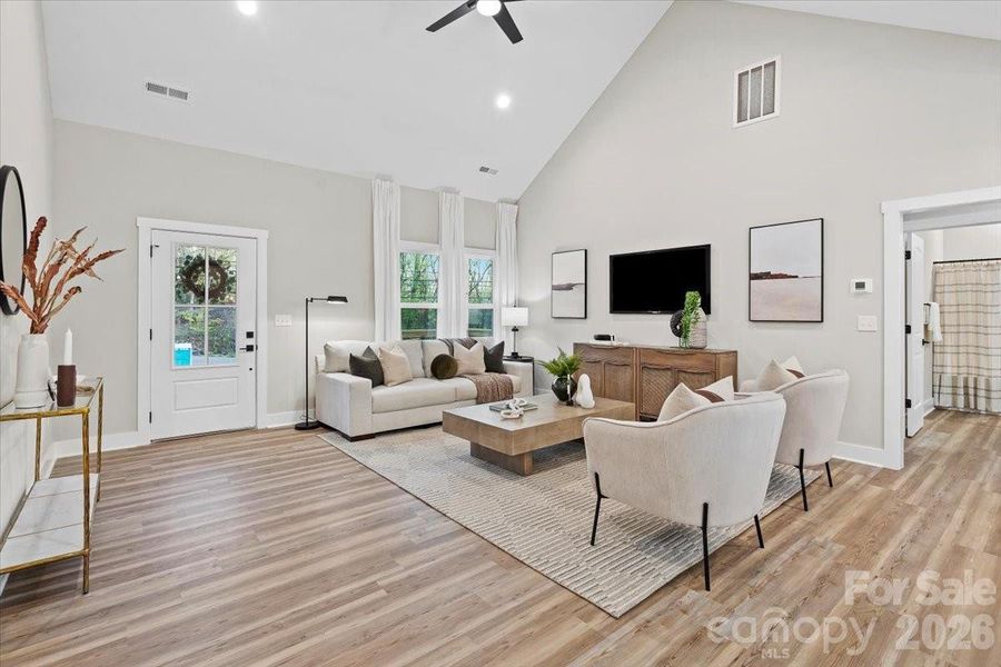 Photo of nearly identical home so you can see the space with furniture.