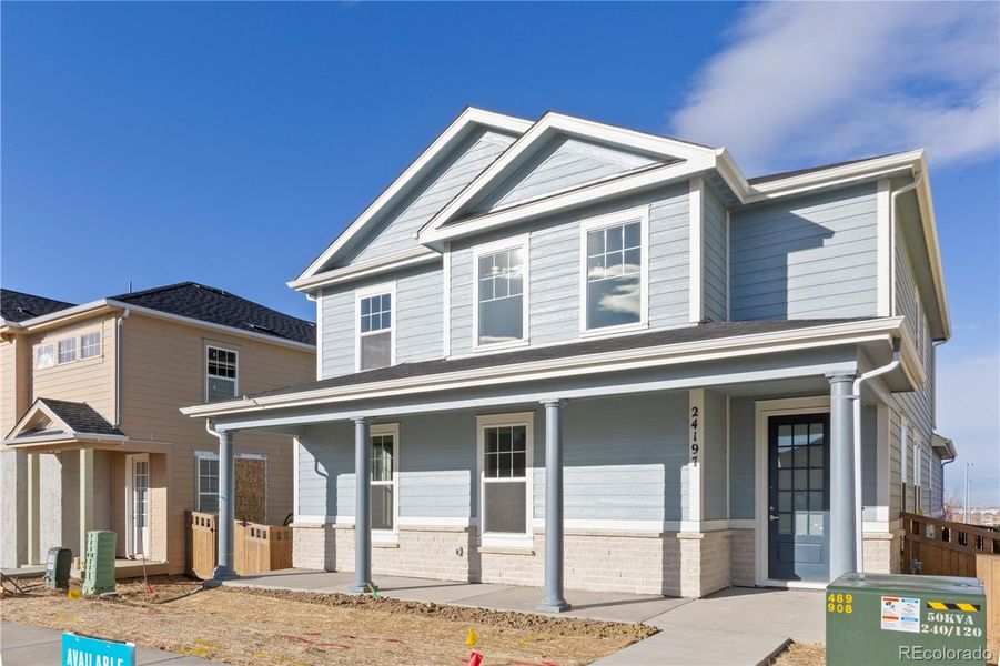 Front exterior of a new home in Windler Single Family Homes, Aurora, CO, highlighting curb appeal (Image 1). Front exterior of a new home in Windler Single Family Homes, Aurora, CO, highlighting curb appeal (Image 1).