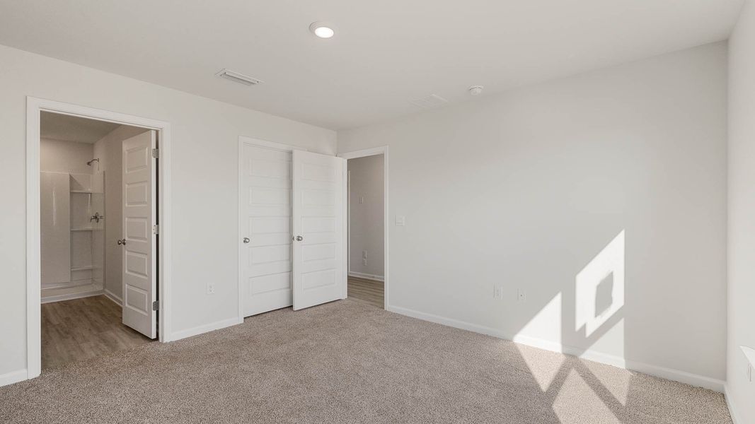 Spacious, unfurnished interior of a new home in Magnolia at the Bluffs Phase 3, Freeport (Image 14).