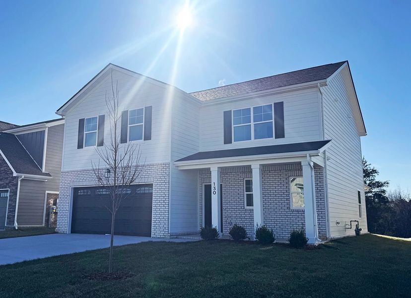 Front exterior of a new home in Ascent at Arbor Ridge, La Vergne, TN, highlighting curb appeal (Image 22).