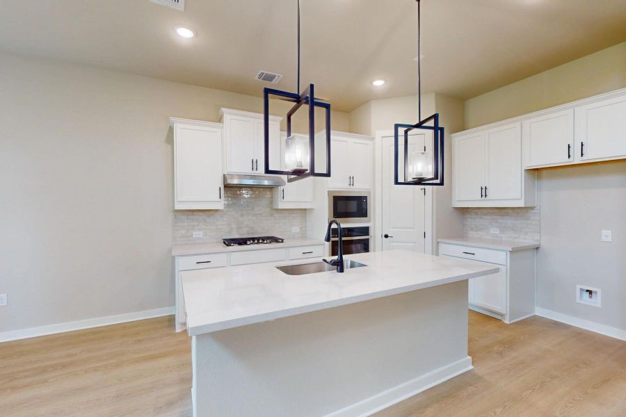 Furnished interior view inside a new home in Edgewood, Leander (Image 12). Furnished interior view inside a new home in Edgewood, Leander (Image 12).