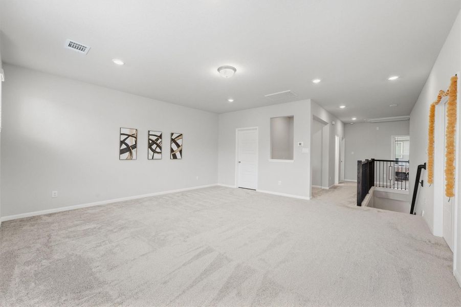 Game Room offers flexible upstairs space for media, lounging, gaming, or recreation.