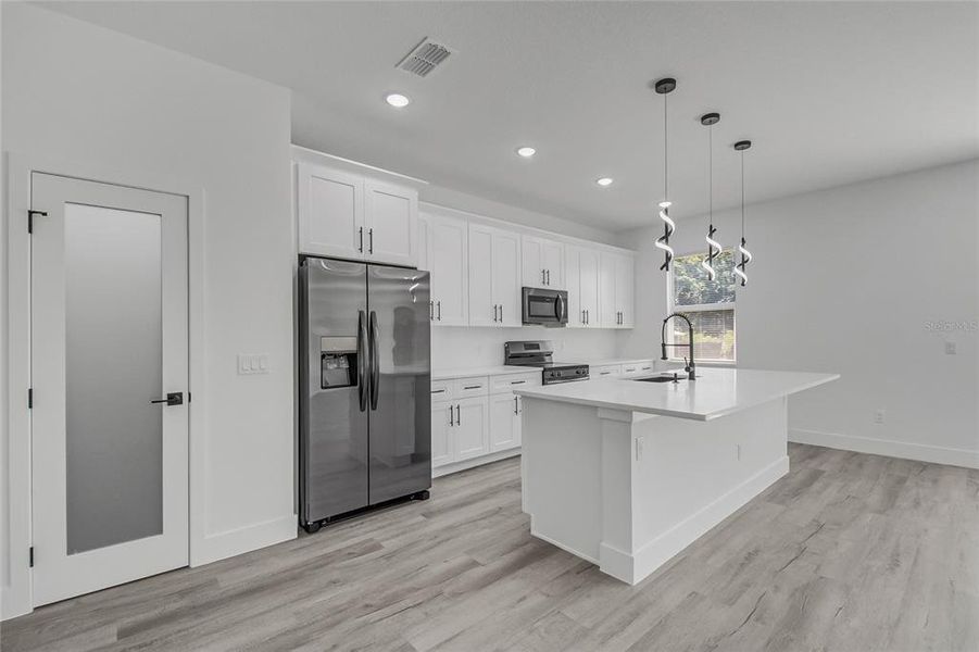 Furnished interior view inside a new home in , St. Cloud (Image 6).