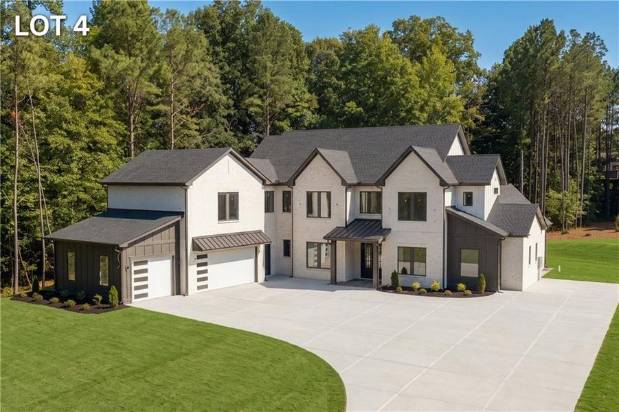 Front exterior of a new home in , Braselton, GA, highlighting curb appeal (Image 1). Front exterior of a new home in , Braselton, GA, highlighting curb appeal (Image 1).