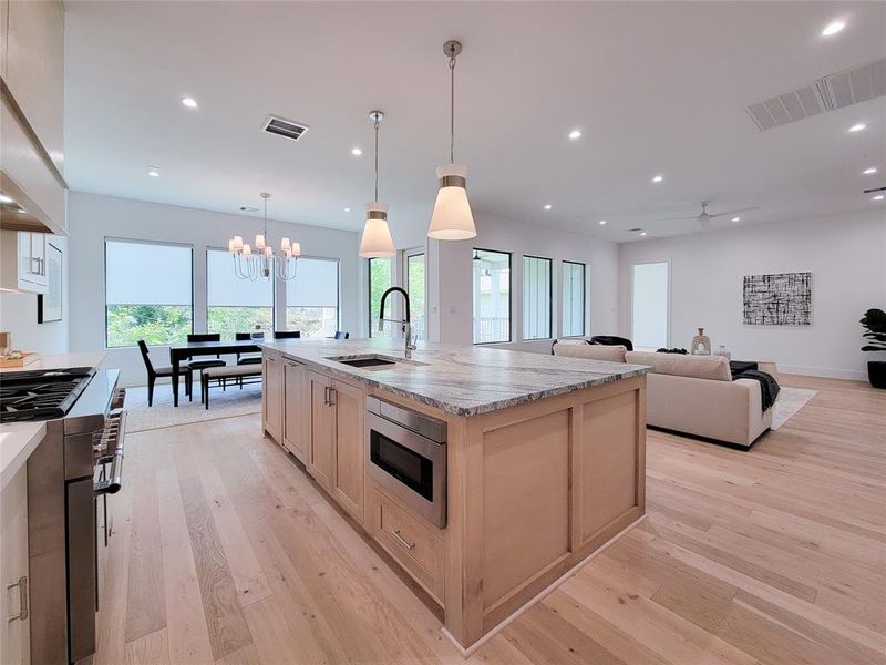 View from the kitchen area toward the living and dining.