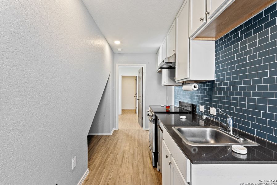 Furnished interior view inside a new home in Elm Trails, San Antonio (Image 6).