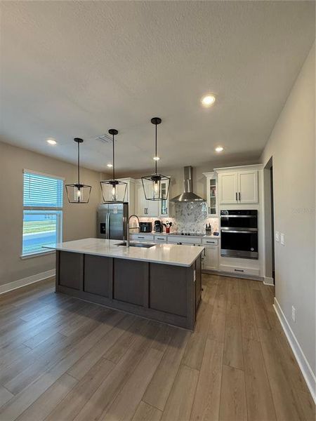 Furnished interior view inside a new home in Silverleaf Reserve Bungalows, Winter Garden (Image 3).