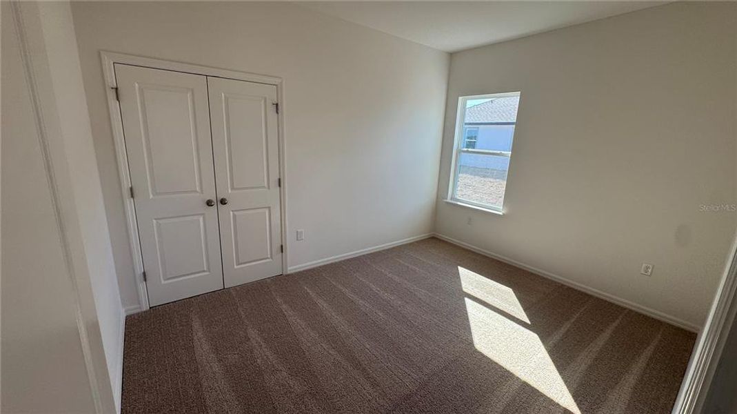 Spacious, unfurnished interior of a new home in Applewood Reserve, Lakeland (Image 20).