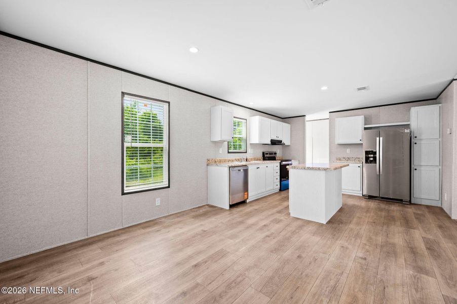 Furnished interior view inside a new home in , Lake City (Image 8).